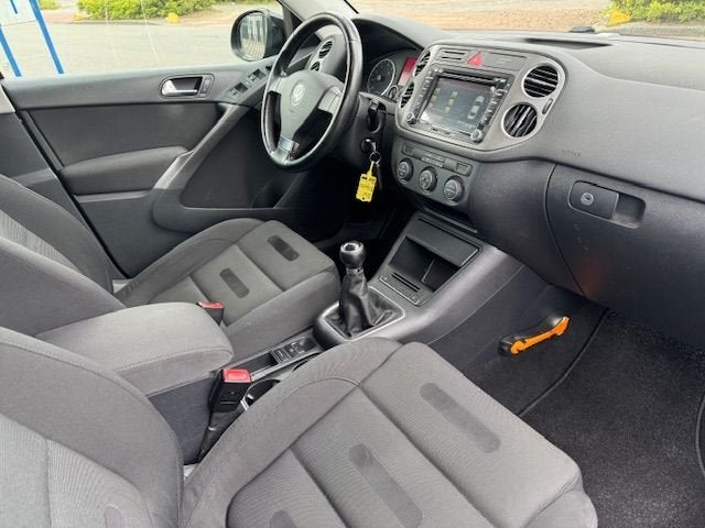 Volkswagen Tiguan 1.4 TSI 150pk Sport&Style Airco/ECC,Cruise, Auto's, Volkswagen, Euro 5, Stof, Zwart, 4 cilinders