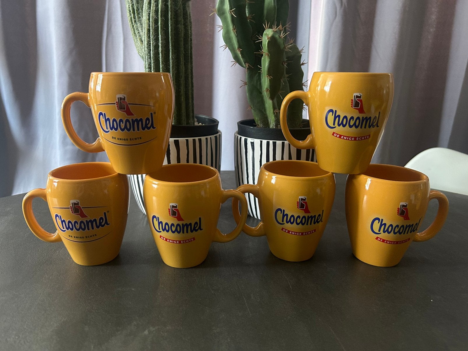6 Chocomel Bekers in uitstekende staat., Ophalen of Verzenden, Zo goed als nieuw, Overige stijlen, Kop(pen) en/of Schotel(s)