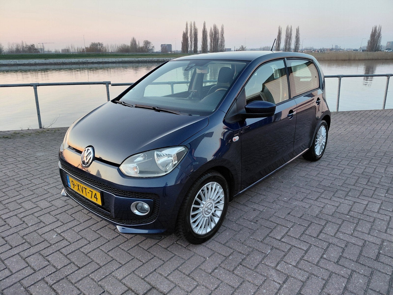 Volkswagen up! 1.0 44KW/60PK 5-DRS 2014 Blauw, Voorwielaandrijving, Up!, 840 kg, Leder en Stof