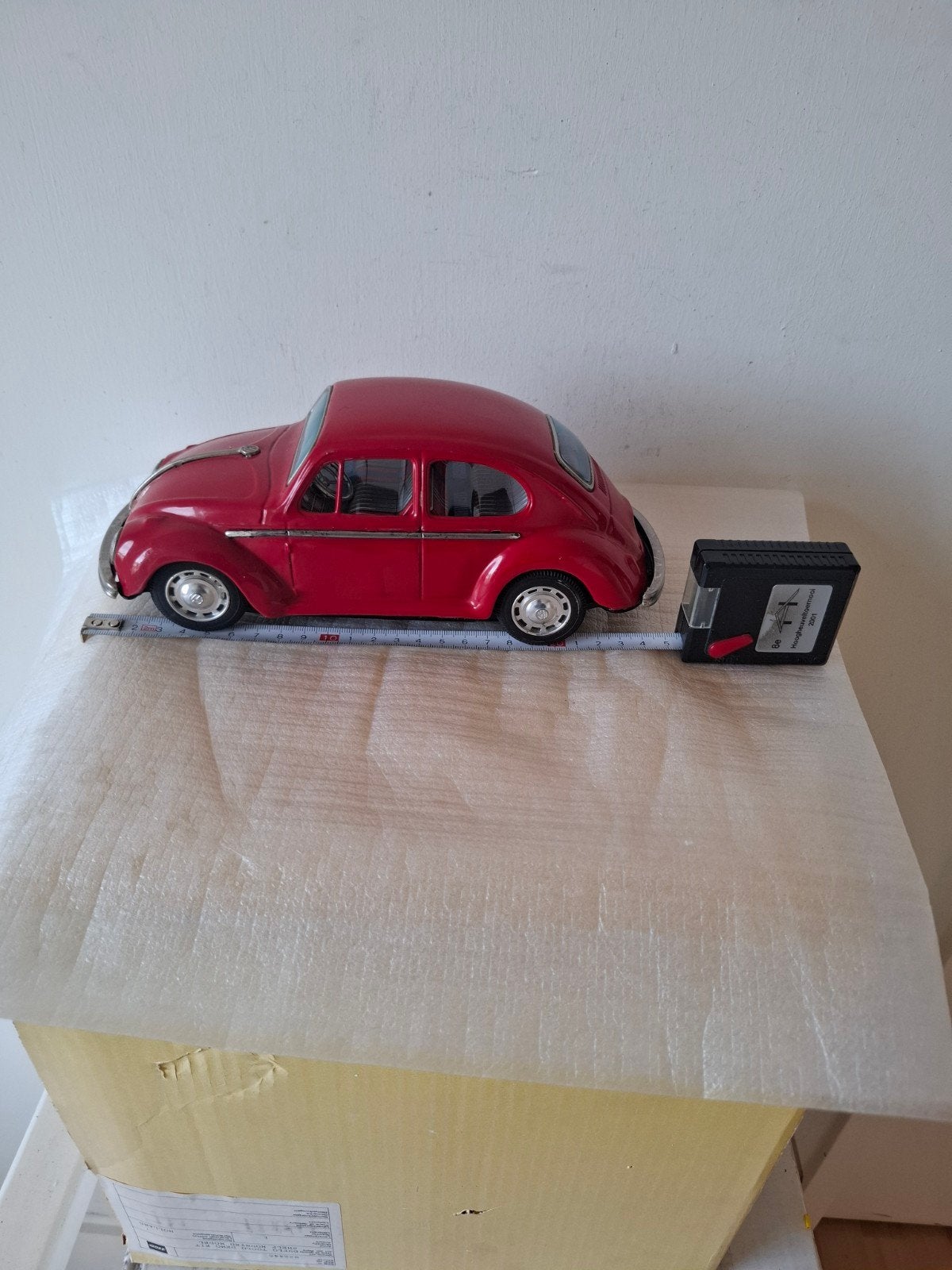 Blikken VW Kever made in Japan de werking is goed zie foto's, Ophalen of Verzenden