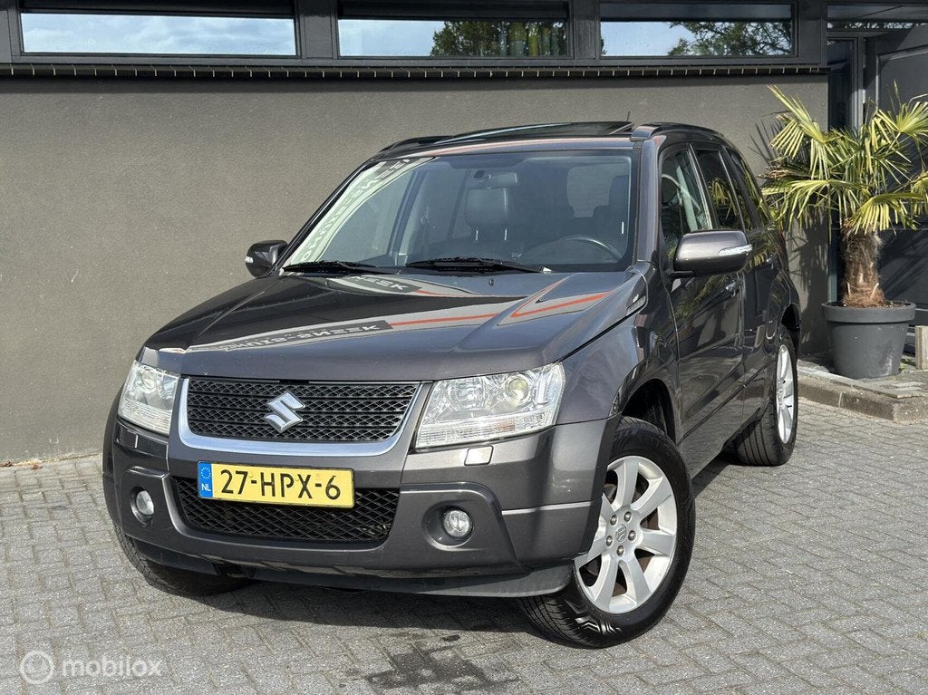 Suzuki Grand Vitara 2.4 High Executive 4x4 | Pano | Trekhaak, Gebruikt, 4 cilinders, 1850 kg, Grand Vitara