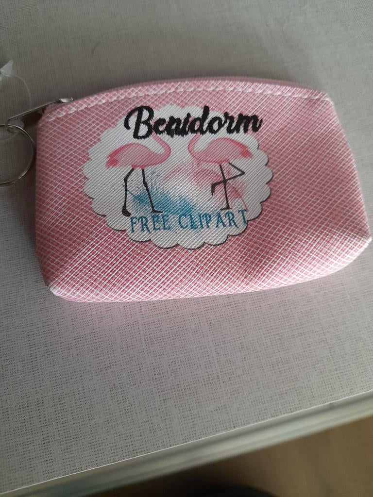 Bijna gratis nieuwe Benidorm Flamingo Portomonnee roze, Ophalen of Verzenden, Nieuw, Roze, Overige merken