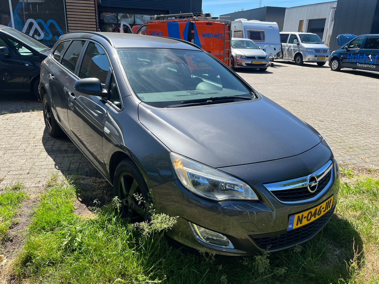Opel Astra 1.4 74KW Sports Tourer 2011 Grijs, Voorwielaandrijving, Euro 5, Stof, 4 cilinders