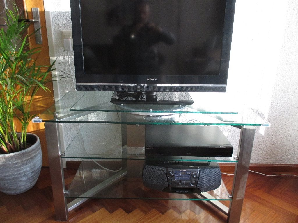 Modern t.v. meubel met draaibaar plateau., Ophalen, Zo goed als nieuw, Glas, Minder dan 100 cm