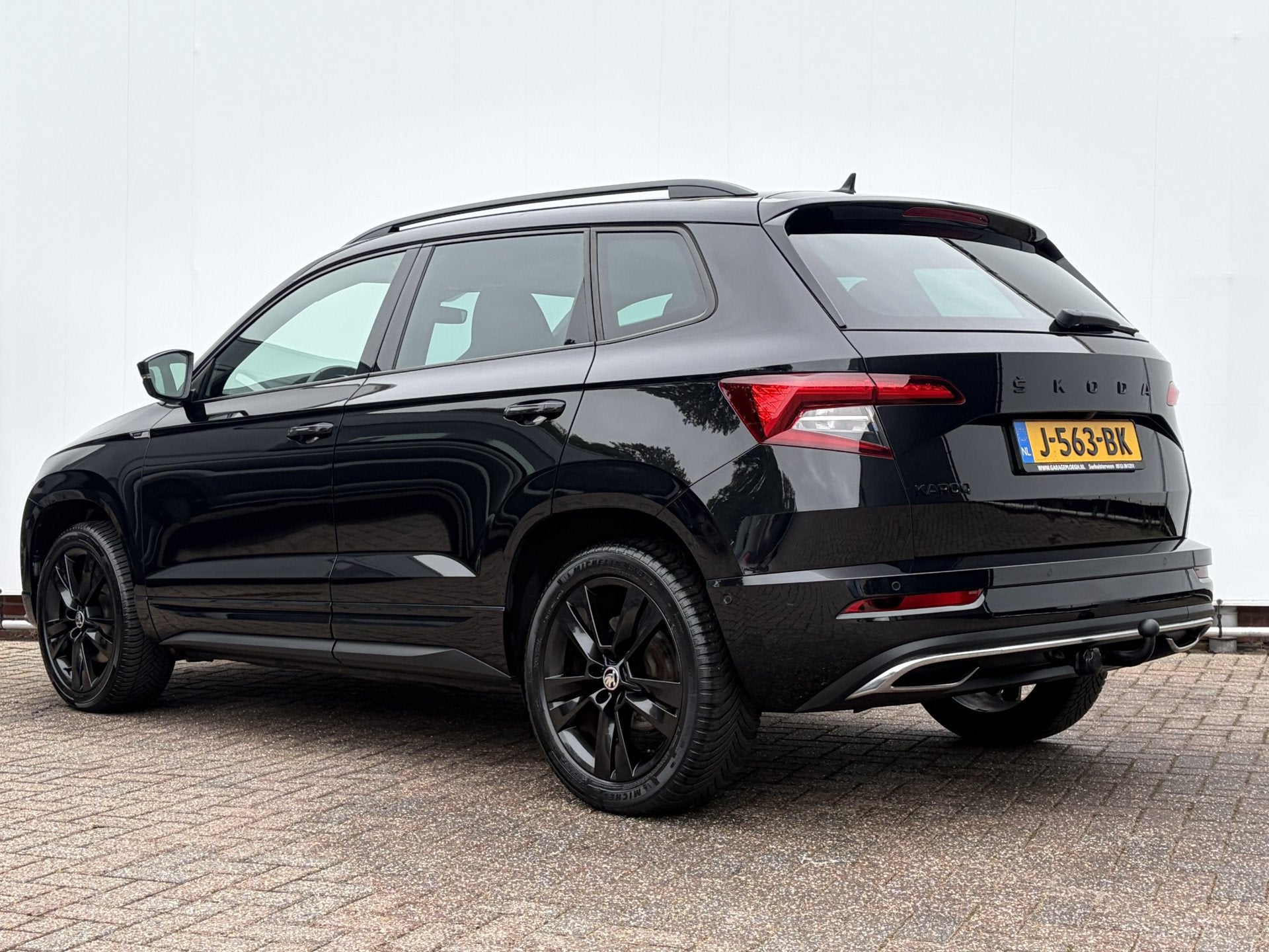 Skoda Karoq 1.5 TSI ACT Sportline Business Trekhaak Adap.Cru, 4 cilinders, 150 pk, Zwart, Bedrijf