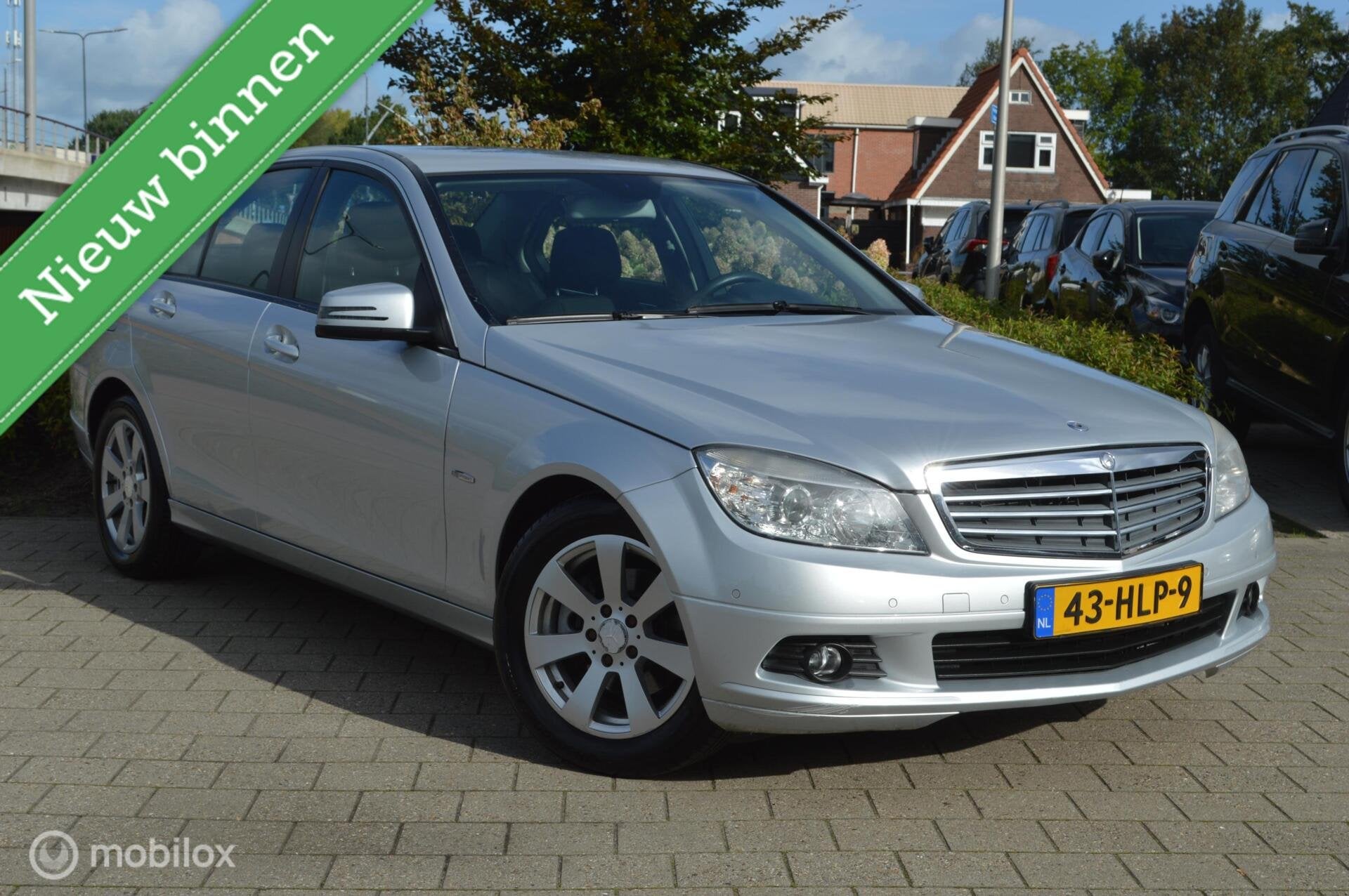 Mercedes C-klasse 180 K BlueEFFICIENCY First Edition, Auto's, Gebruikt, Zwart, Handgeschakeld, Sedan