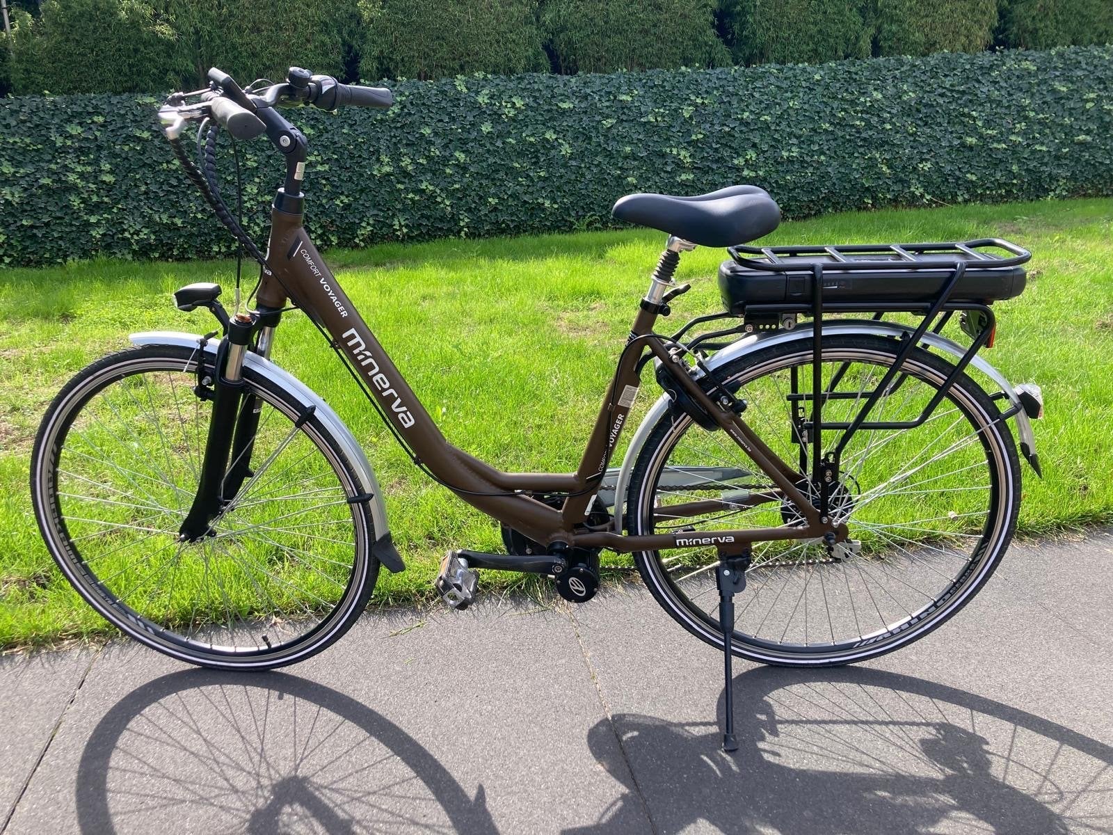 Minerva Voyager Comfort E-bike - Bruin, Zo goed als nieuw, 51 tot 55 cm, 50 km per accu of meer, Ophalen