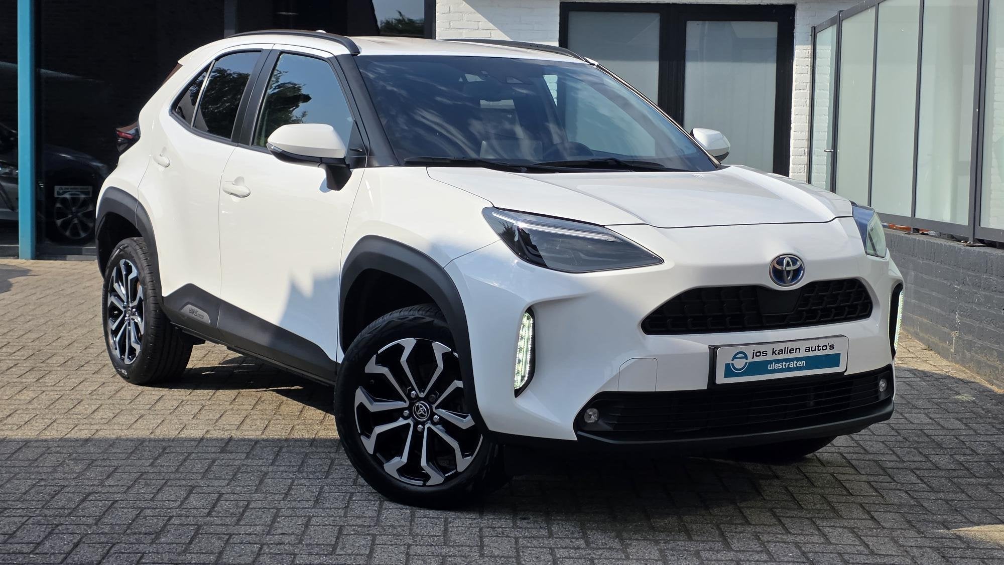 Toyota Yaris Cross 1.5 Hybrid Dynamic 116pk Navi, Camera, Pr, Auto's, Dealer onderhouden, Stof, Gebruikt, Euro 6