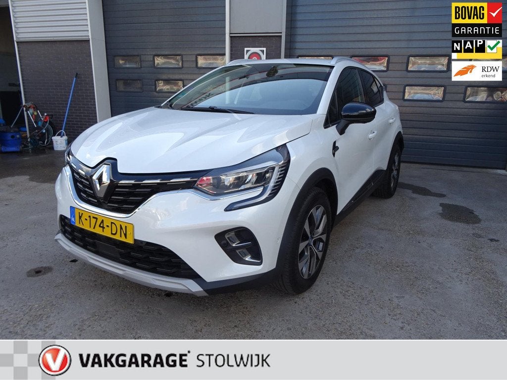 Renault Captur 1.6 E-Tech Plug-in Hybrid 160 Intens, Parelmo, 77 km/l, Gebruikt, 4 cilinders, Leder en Stof