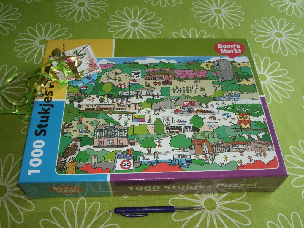 Nieuw in seal: cartoonpuzzel Boon's markt - Uddel, Ophalen of Verzenden, 500 t/m 1500 stukjes, Nieuw, Legpuzzel