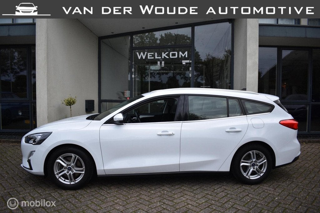 Ford Focus Wagon 1.0 EcoBoost Hybrid Trekhaak AGR Navi|LED, Stof, Wit, Origineel Nederlands, Lichtsensor