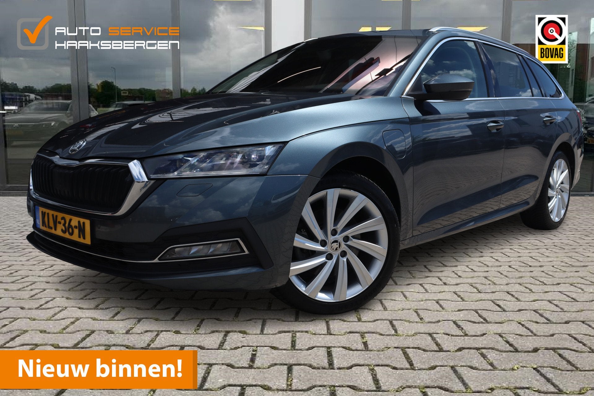 Skoda Octavia Combi 1.4 TSI iV PHEV Business Edition | ACC |, Gebruikt, Leder en Stof, Plug-in hybride, 1500 kg