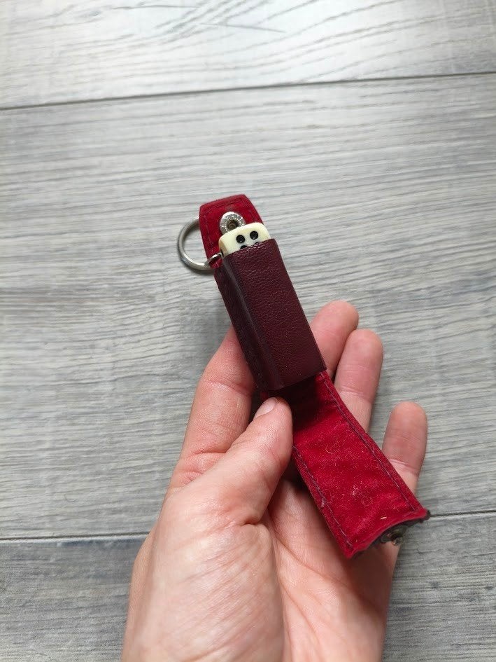 Mini dobbelsteen sleutelhanger in leren etui, Ophalen of Verzenden, Zo goed als nieuw, Overige typen