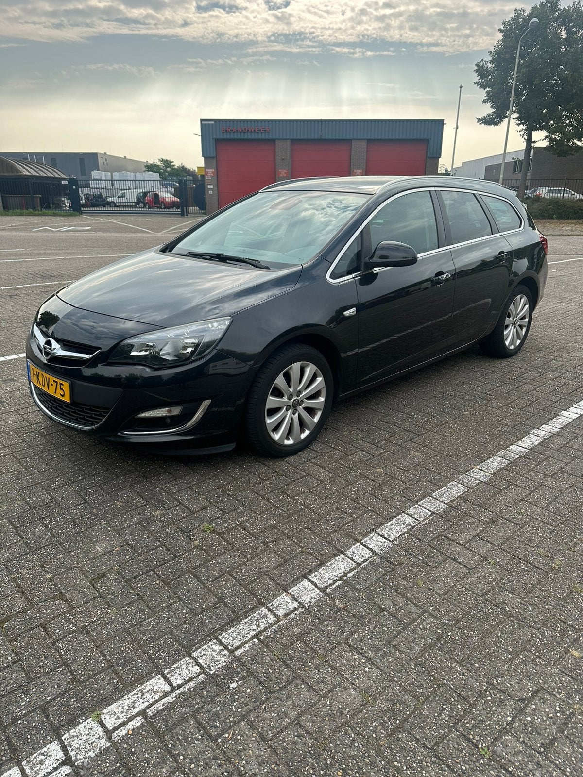 Opel Astra 1.4 Turbo 88KW Sports Tourer 2013 Zwart, Voorwielaandrijving, 4 cilinders, Zwart, Origineel Nederlands