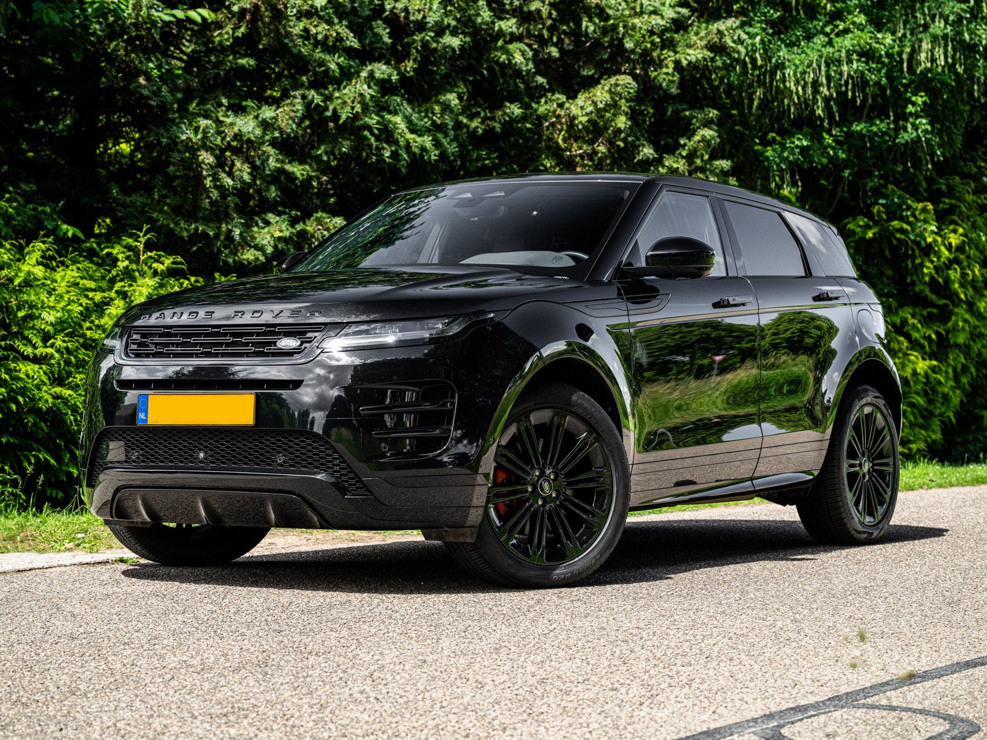 Land Rover RANGE ROVER EVOQUE 1.5 P300e AWD R-Dynamic HSE, Auto's, Automaat, 14 kWh, Automatische klimaatregeling, Zwart