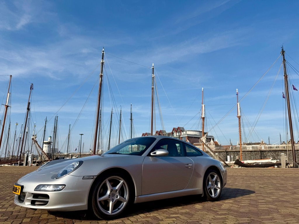 Schitterende Porsche 911 (2010) met 52000 km! en 6V-handbak, Auto's, Achterwielaandrijving, 4 stoelen, Automatische klimaatregeling