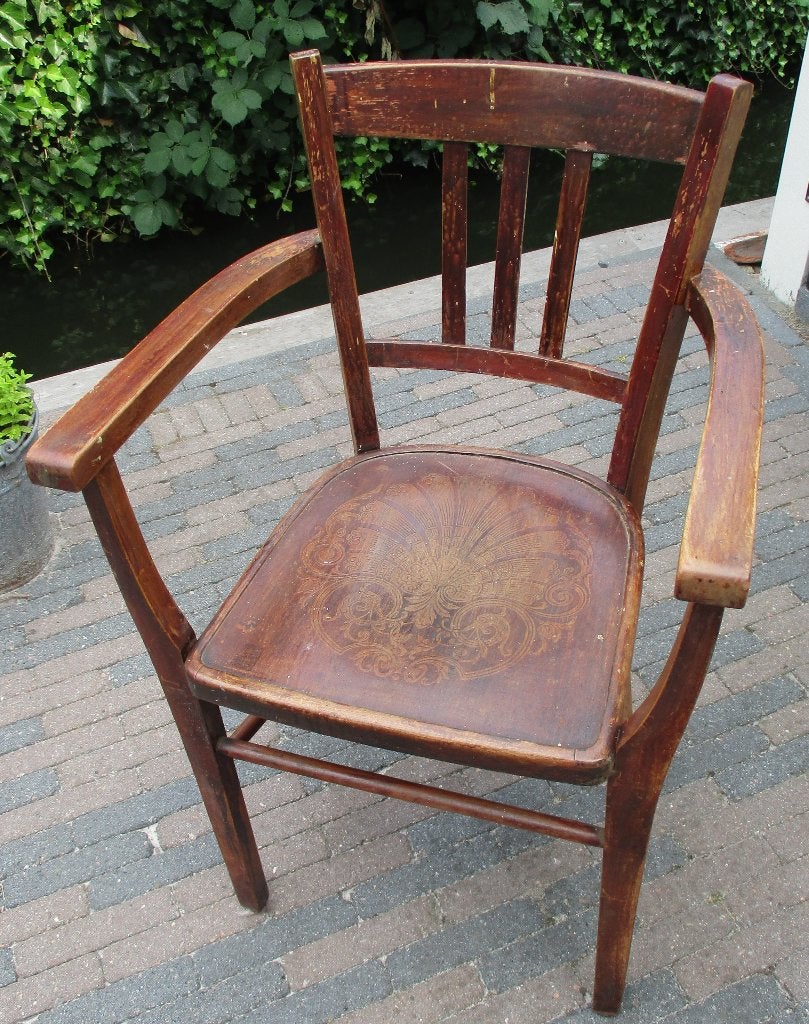 Antieke houten stoel met armleuning, Ophalen