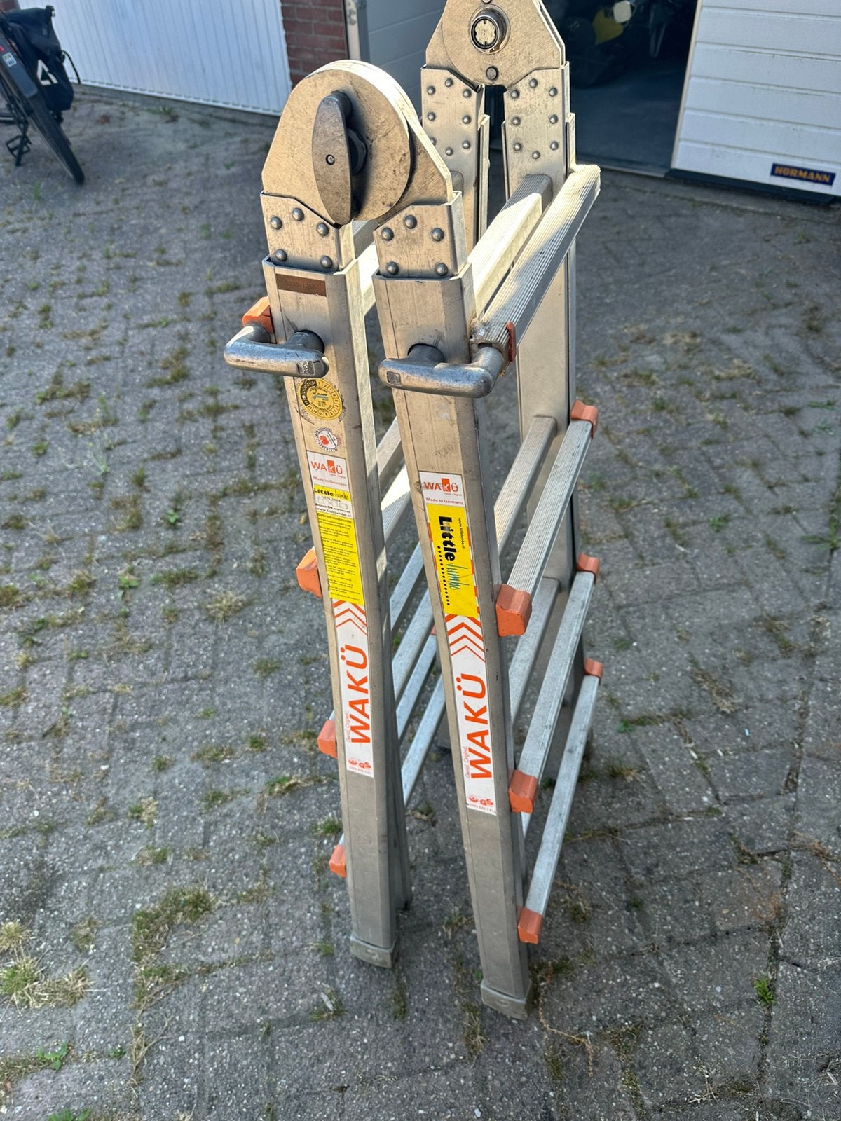 Telescopische vouwladder Waku 4 x 4 met klein gebrek, Ophalen, Gebruikt, Trap, Opvouwbaar of Inschuifbaar