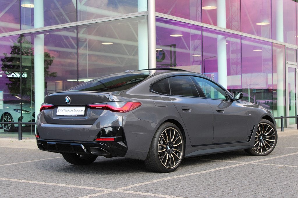 BMW 4 Serie Gran Coupé M440i xDrive High Executive Automaat, Auto's, BMW, 1800 kg, Met garantie (alle), Bedrijf, Vierwielaandrijving