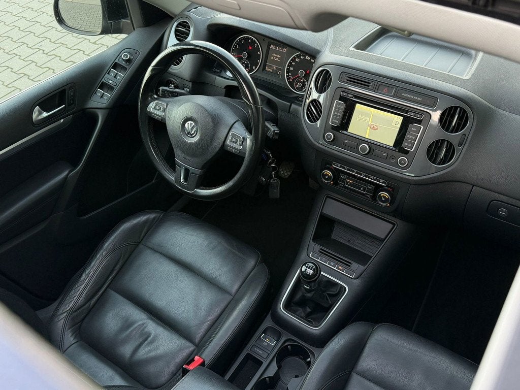 Volkswagen Tiguan 1.4 TSI Sport&Style|Pano|led|Ler|Rijklaar, Voorwielaandrijving, Euro 5, 15 km/l, Gebruikt