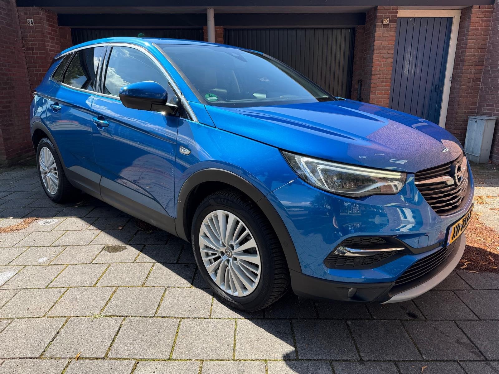 Opel Grandland X 1.2 Turbo Innovation, Gebruikt, 1199 cc, Blauw, Leder en Stof