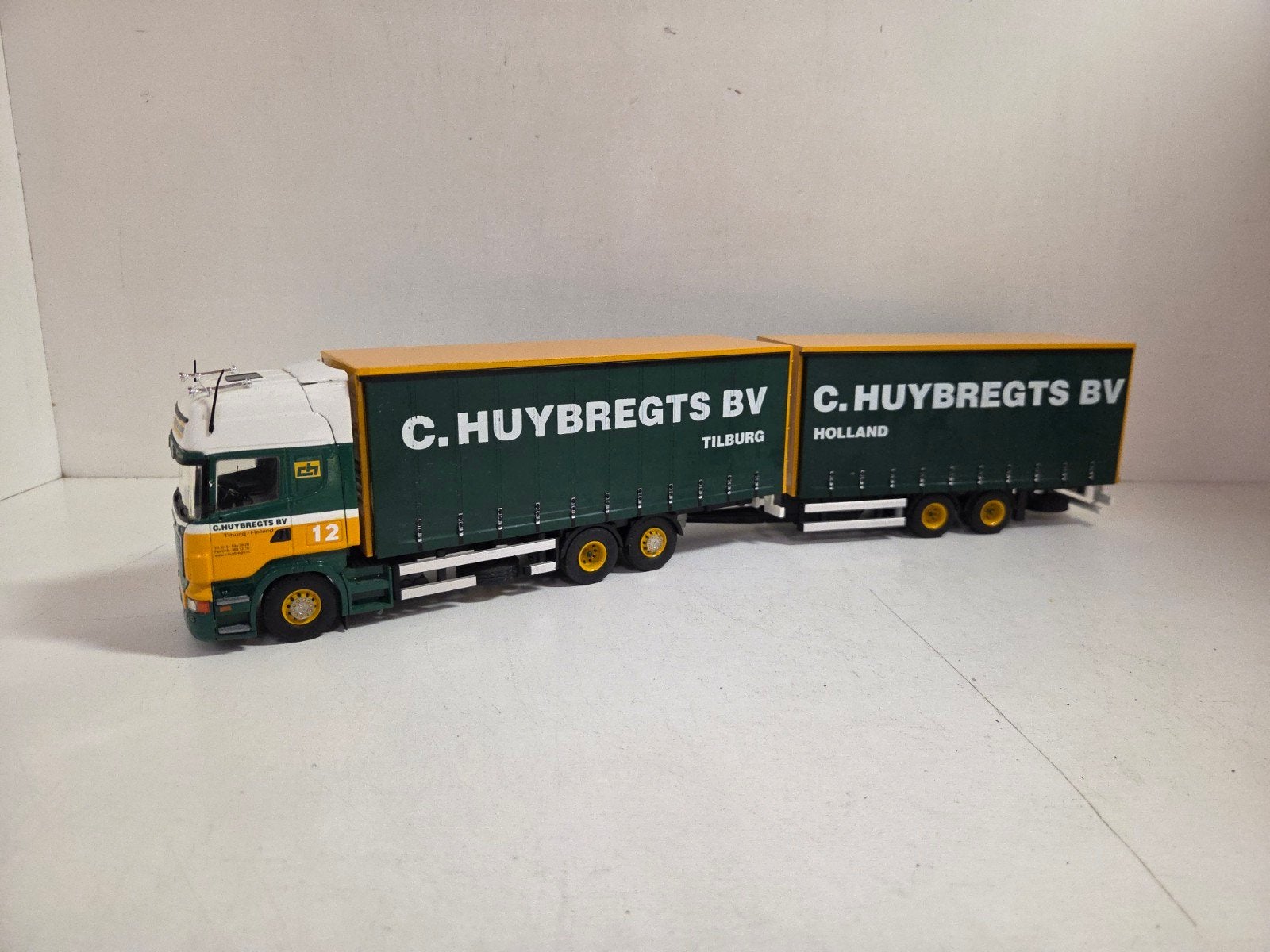 Tekno Scania R combi Huybregts Tilburg, Hobby en Vrije tijd, Modelauto's | 1:50, ., Zo goed als nieuw, ., Ophalen of Verzenden