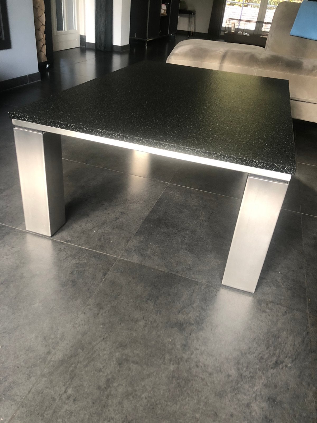 Granieten salontafel met rvs onderstel, Ophalen, Gebruikt, 100 tot 150 cm, 50 tot 100 cm