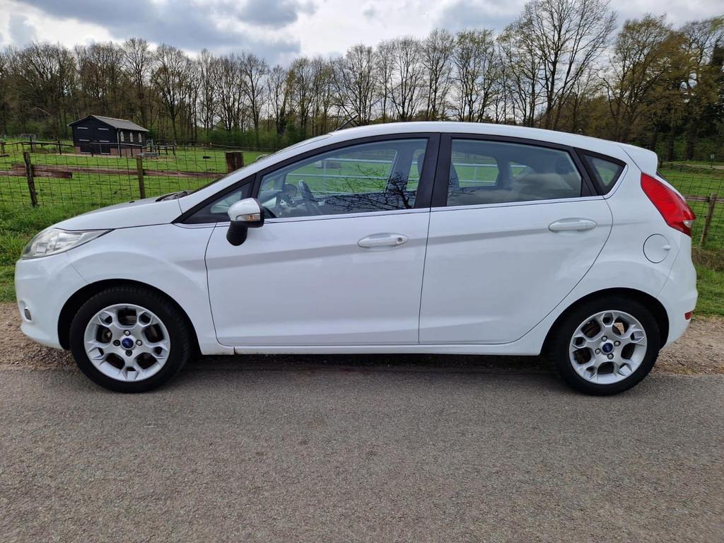 Ford Fiesta 1.25 Titanium pas 95.000km clima/cruise, Voorwielaandrijving, Euro 5, Stof, 1242 cc