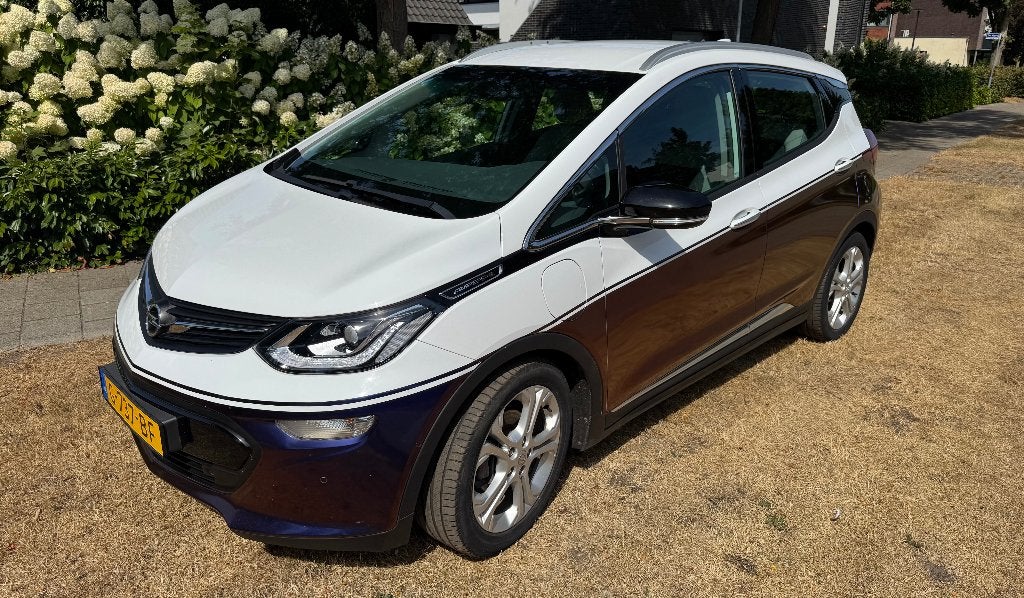 Opel Ampera-e 60-kWh 204pk 2019 Wit met two-tone wrap, Stof, 69 min, Bi-Xenon koplampen, Wit