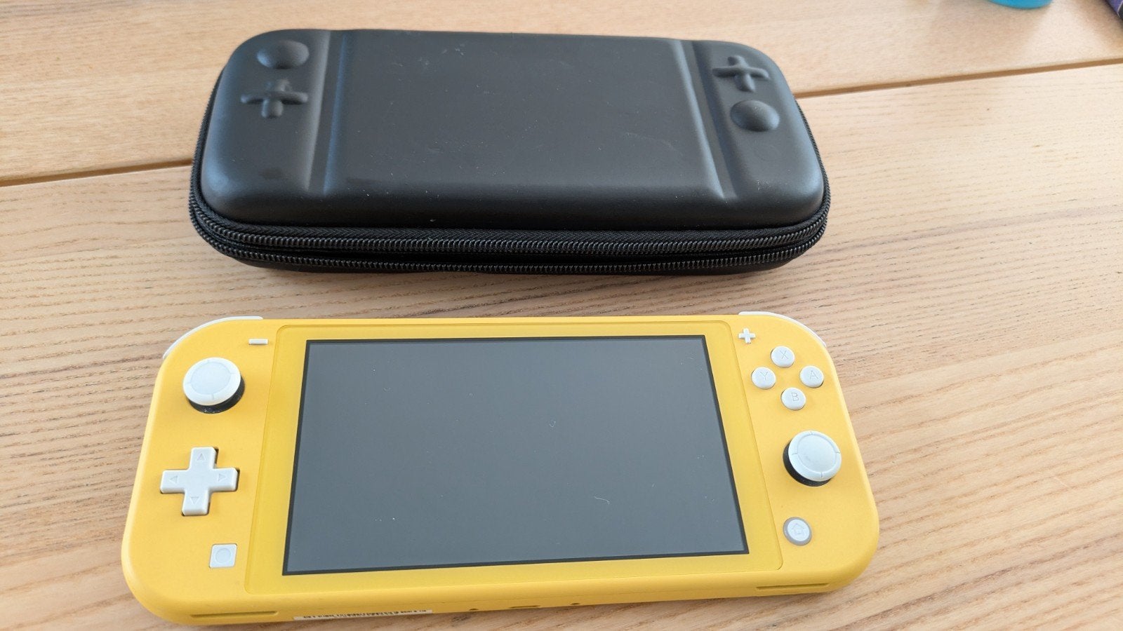 Nintendo Switch Lite geel met beschermhoesje, Spelcomputers en Games, Ophalen, Geel, Zo goed als nieuw