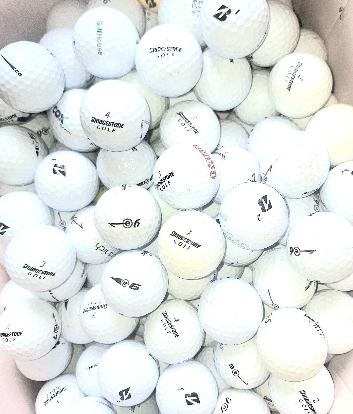 50 Bridgestone E5,6,7,12 mix golfballen, Ophalen of Verzenden, Bal(len)