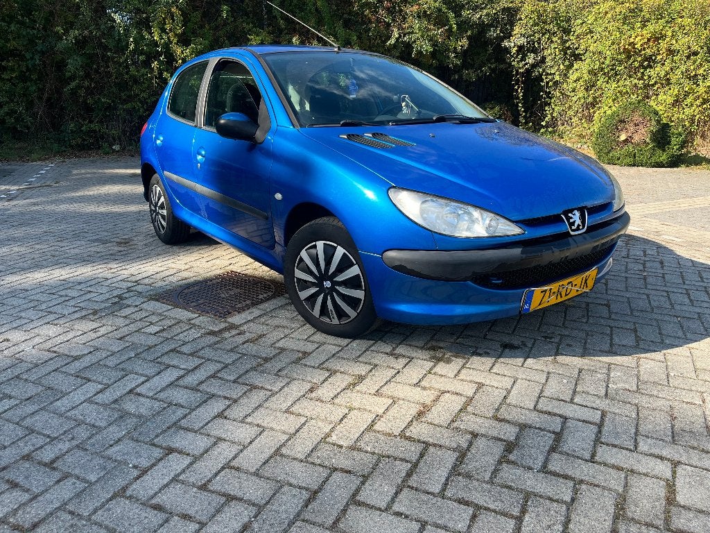Peugeot 206 1.4 5D 2005 Blauw, Auto's, Voorwielaandrijving, Stof, 31 €/maand, 4 cilinders
