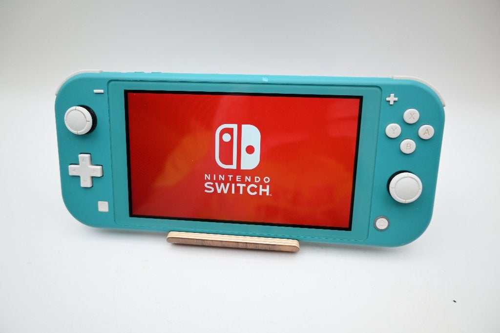 Nintendo Switch lite 32GB 2019 Turquoise, 1 speler, Ophalen of Verzenden, Zo goed als nieuw, X