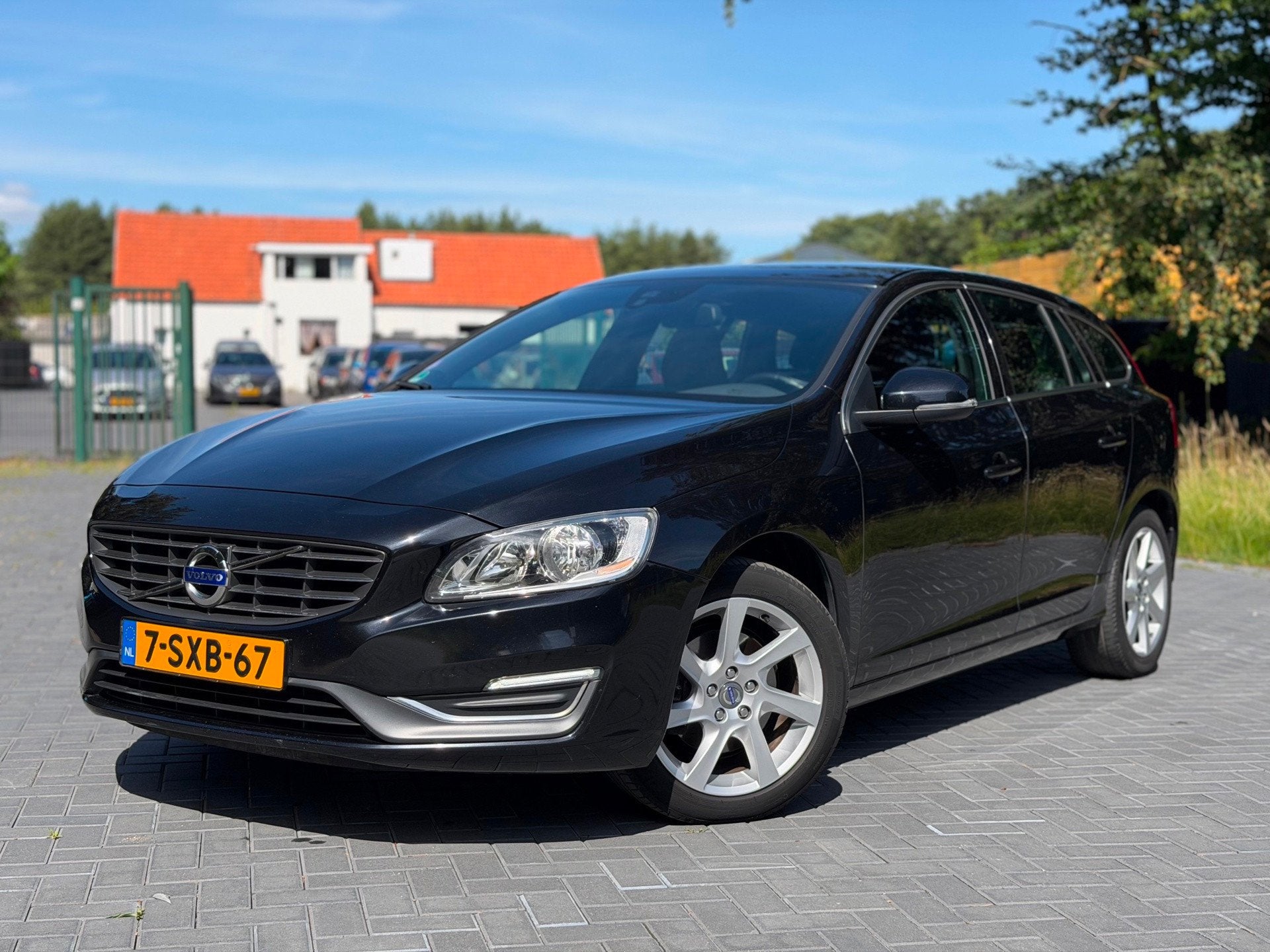 Volvo V60 1.6 T4 Summum/Airco/Cruise/Leer/LMV/Elekt Raam, Auto's, Voorwielaandrijving, Gebruikt, 4 cilinders, Zwart
