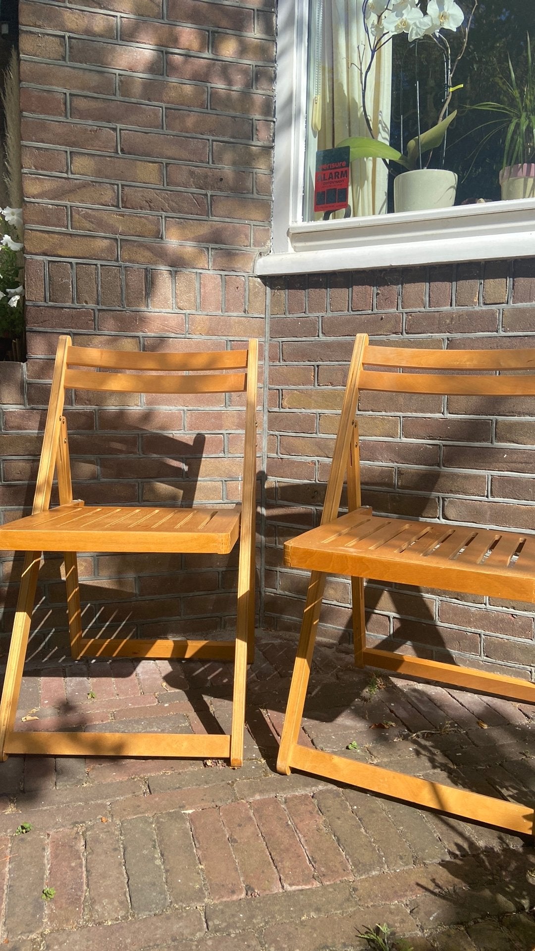 Inklapbare houten stoeltjes, Ophalen