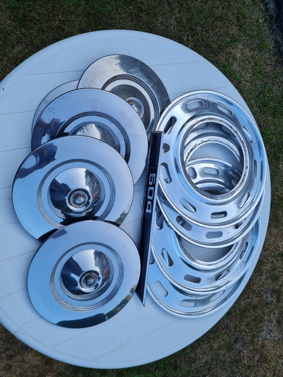 4 Wieldoppen peugeot 504 met 4 ringen., Auto diversen, Wieldoppen, Ophalen