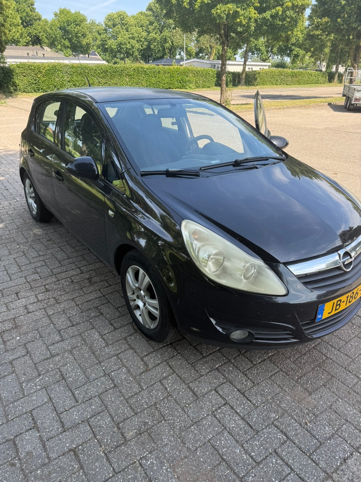 Opel Corsa 1.2 16V 5D 2008 Zwart, Auto's, Voorwielaandrijving, 4 cilinders, 1229 cc, Handgeschakeld
