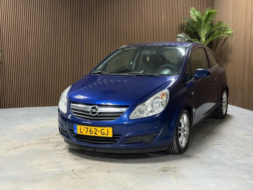 Opel Corsa 1.2-16V Cosmo (bj 2008), Auto's, Opel, Voorwielaandrijving, Parkeersensor, 4 cilinders, Blauw