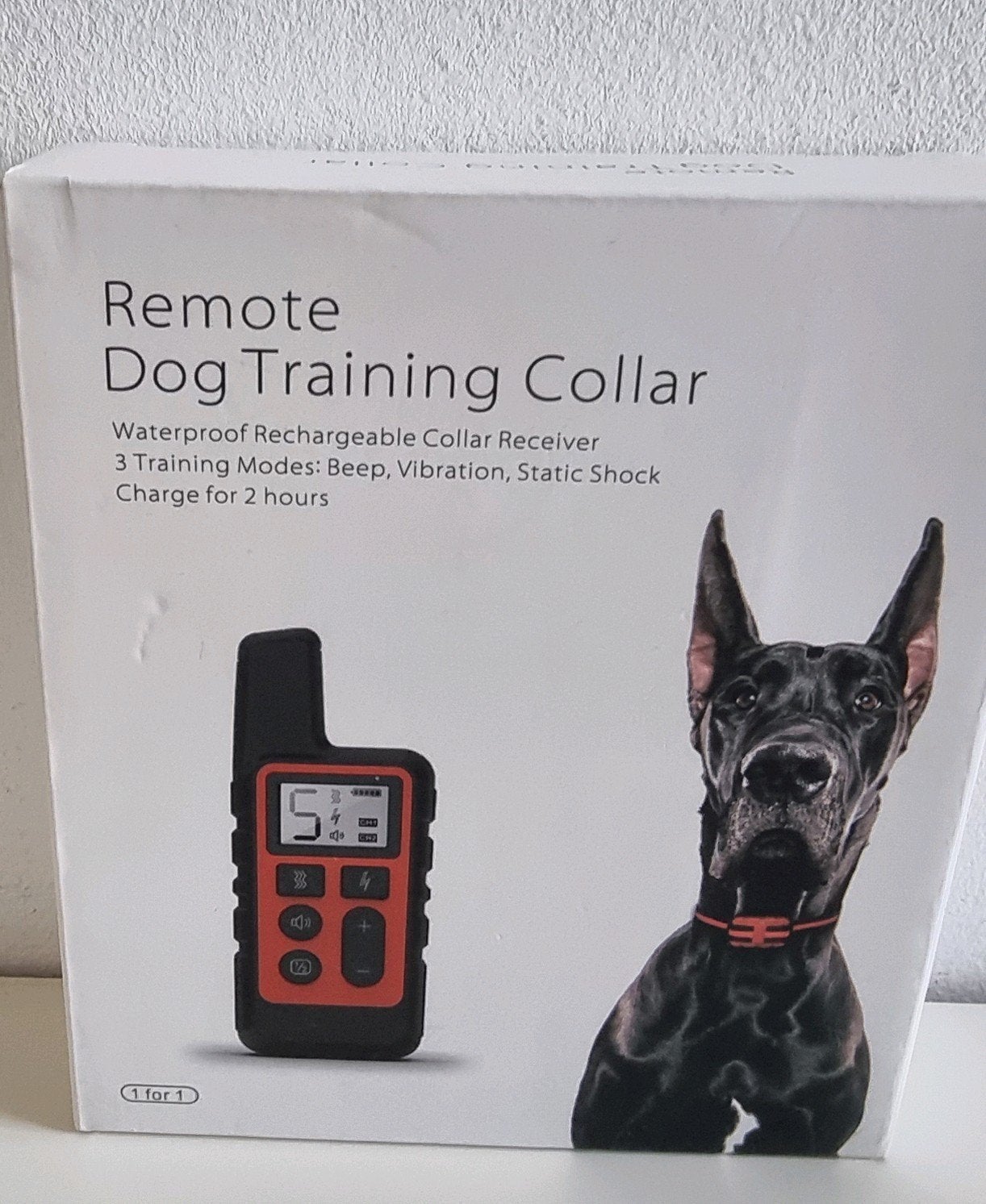 training grootste hond schokhalsband, Ophalen