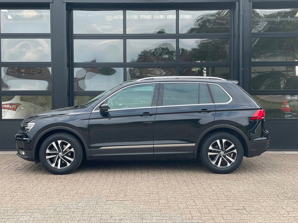 Volkswagen Tiguan 1.5 TSI Comfortline Business, Auto's, Stof, 4 cilinders, Zwart, Origineel Nederlands