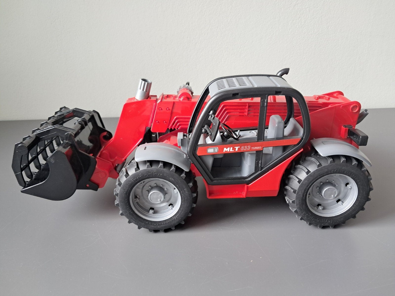 Manitou MLT 633 Turbo Verreiker (speelgoed), Ophalen, Zo goed als nieuw
