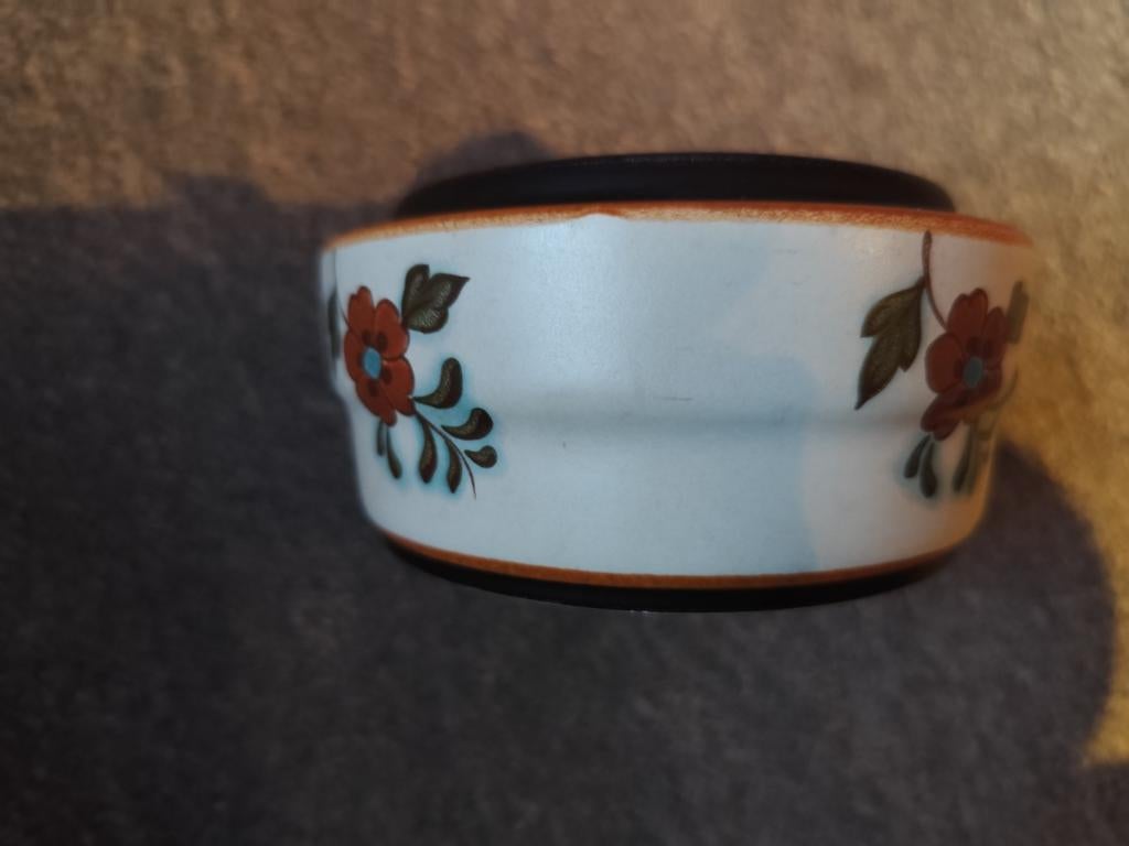 Gouda plateel pot, Ophalen