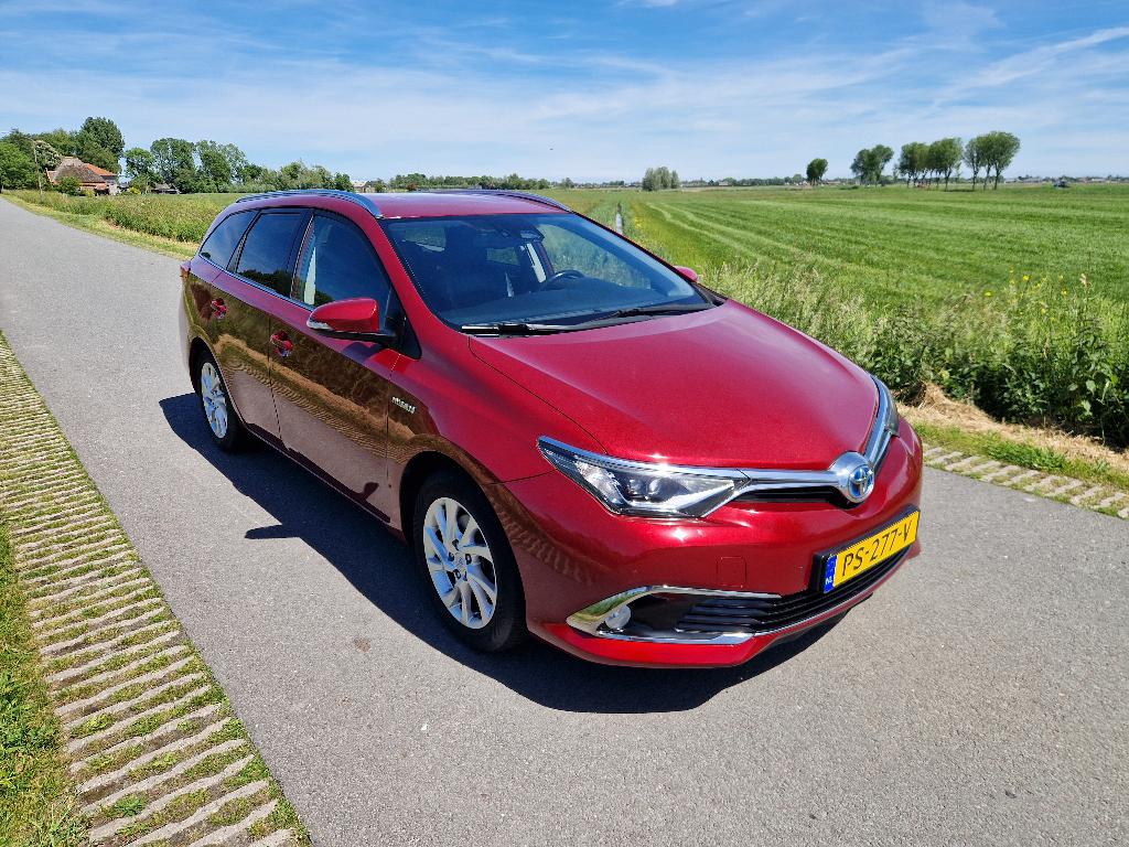 Toyota Auris Touring Sports 1.8 Hybrid Executive Go CVT 2017, Auto's, 28 km/l, 1250 kg, Euro 6, Origineel Nederlands