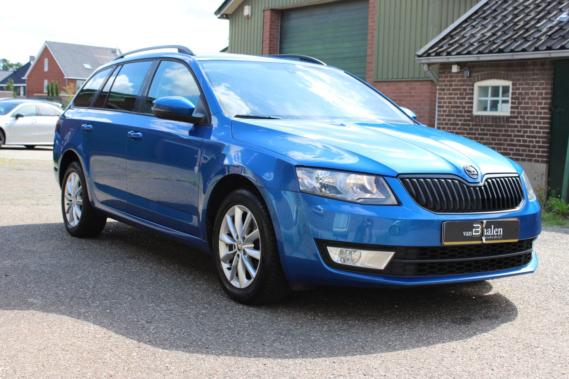 Skoda Octavia Combi 1.2 TSI Ambition Businessline AUTOM NAVI, Auto's, Stof, Gebruikt, Zwart, 4 cilinders