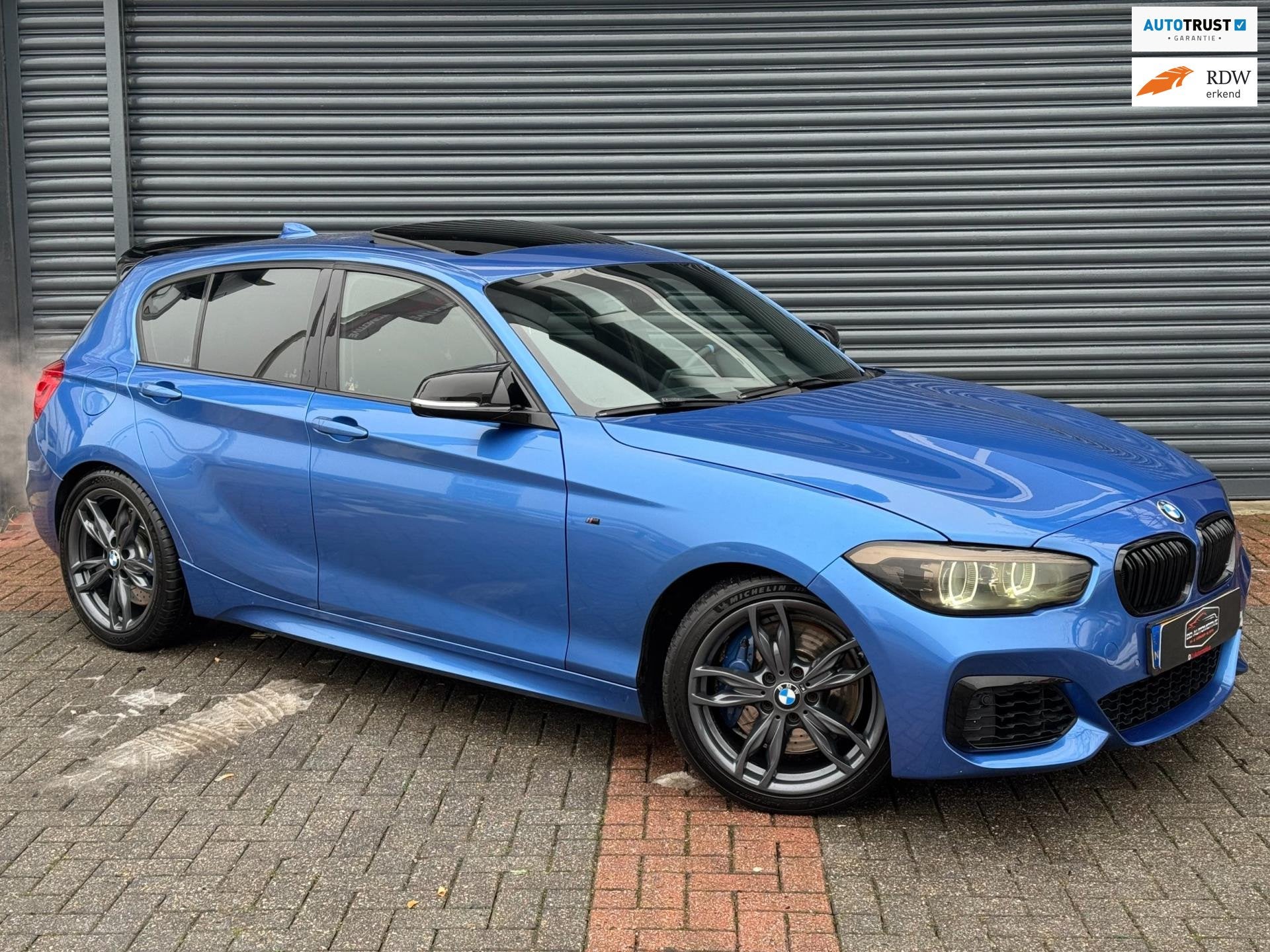 BMW 1-serie M140i High Executive Dak | Rwd | Alcantara | Tar, Auto's, Achterwielaandrijving, Gebruikt, Blauw, Alcantara