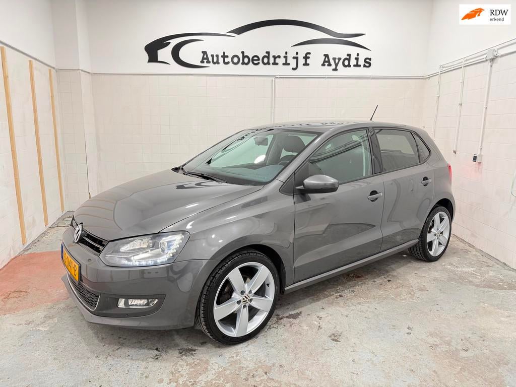 Volkswagen Polo 1.2 TSI Highline Airco Cruise EL Ramen 105PK, Voorwielaandrijving, Euro 5, Stof, Parkeersensor