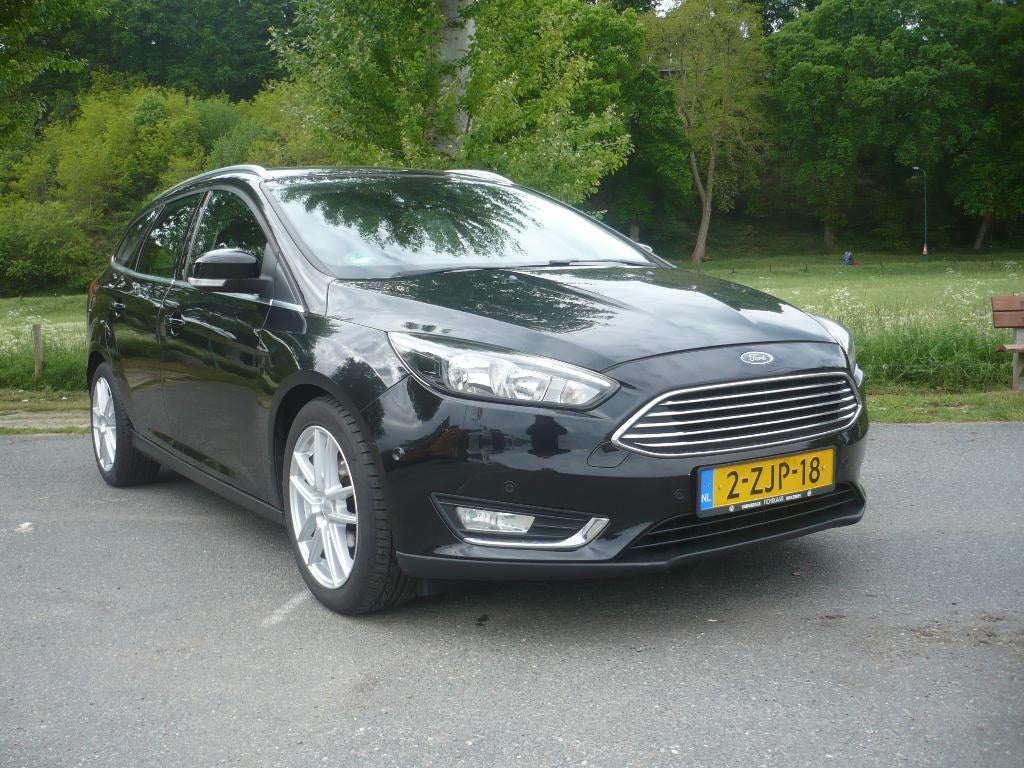 Ford Focus Wagon 1.0 First Edition 125pk Cruise/Clima/Navi, Zwart, Origineel Nederlands, 1216 kg, 3 cilinders