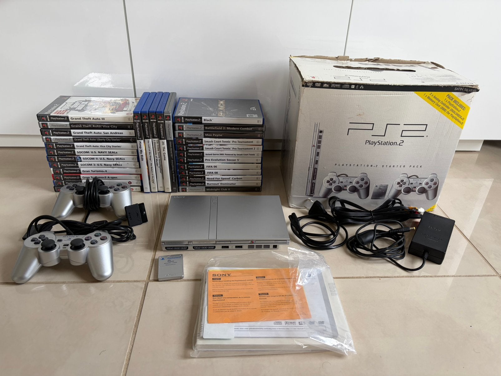 PlayStation 2 Slim Satin Silver - 2x controller - 29 games, Spelcomputers en Games, Spelcomputers | Sony PlayStation 2, Gebruikt