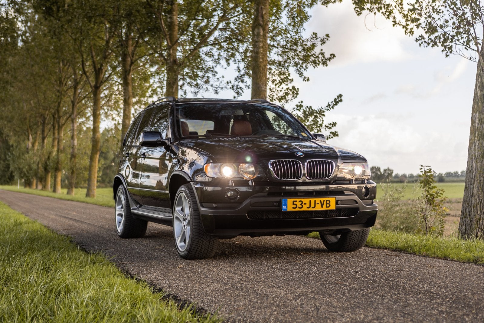 BMW X5 4.6 IS AUT 2002 Zwart, Auto's, Automaat, 138 €/maand, Zwart, Overige kleuren