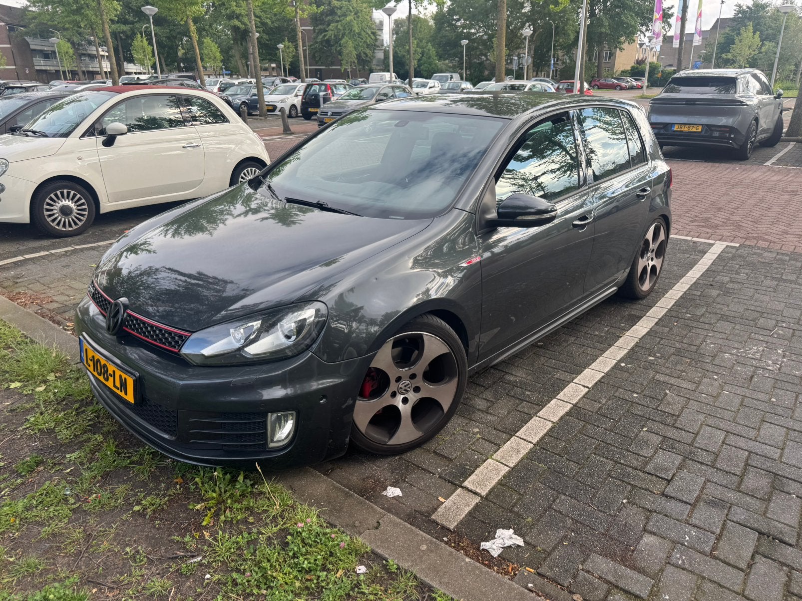 Volkswagen Golf 2.0 GTI 155KW DSG 2010 Grijs, Stof, Zwart, 4 cilinders, 14 km/l
